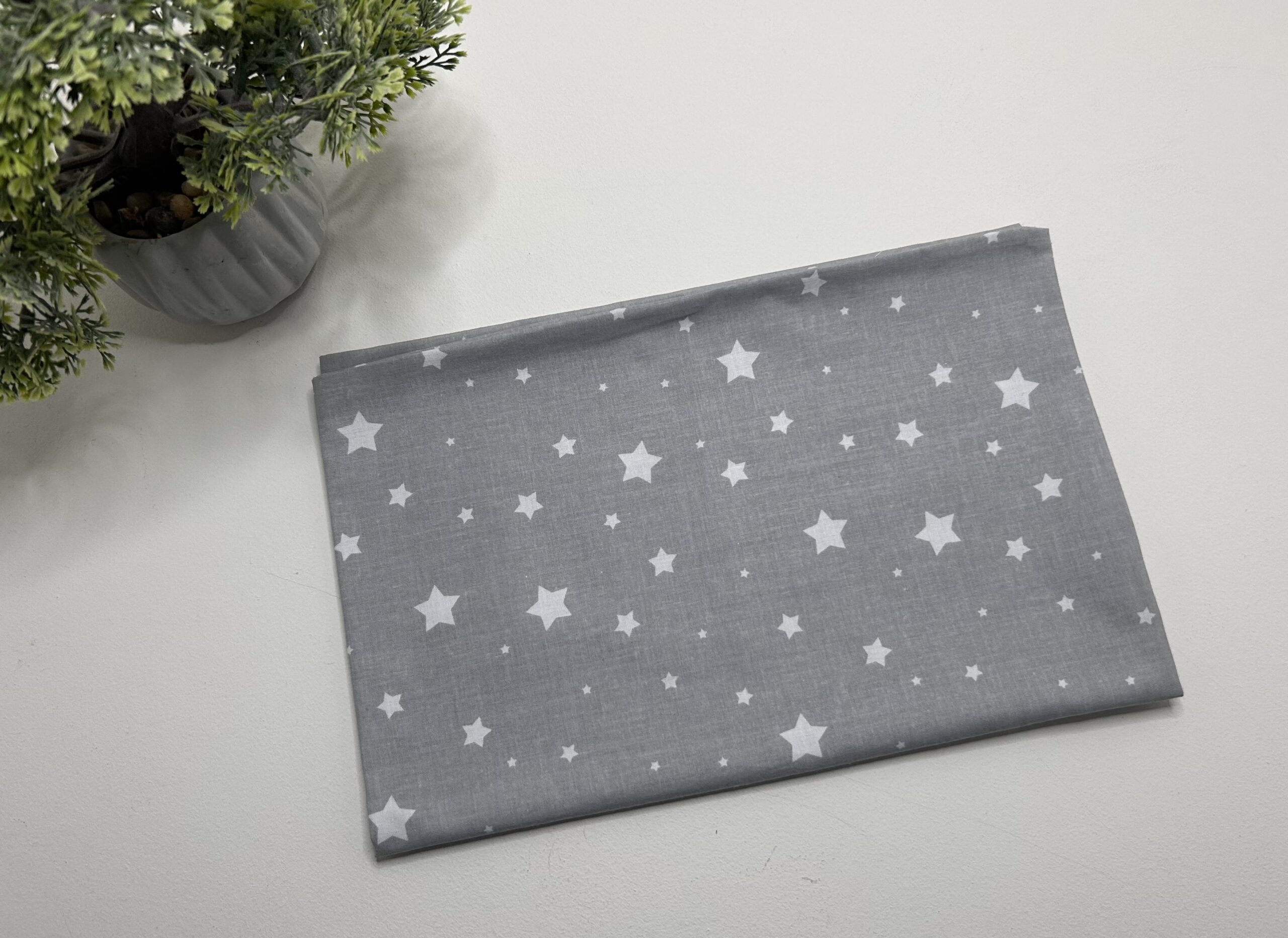 Pagalvės užvalkalas 60x40cm “baltos žvaigždutės pilkame fone”